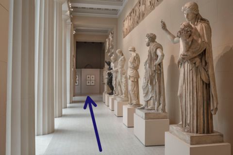 Go past the Greek courtyard and turn left. You will find yourself in Room No. 6. Go straight ahead to Room No. 3, and turn left or go straight ahead to Room No. 1